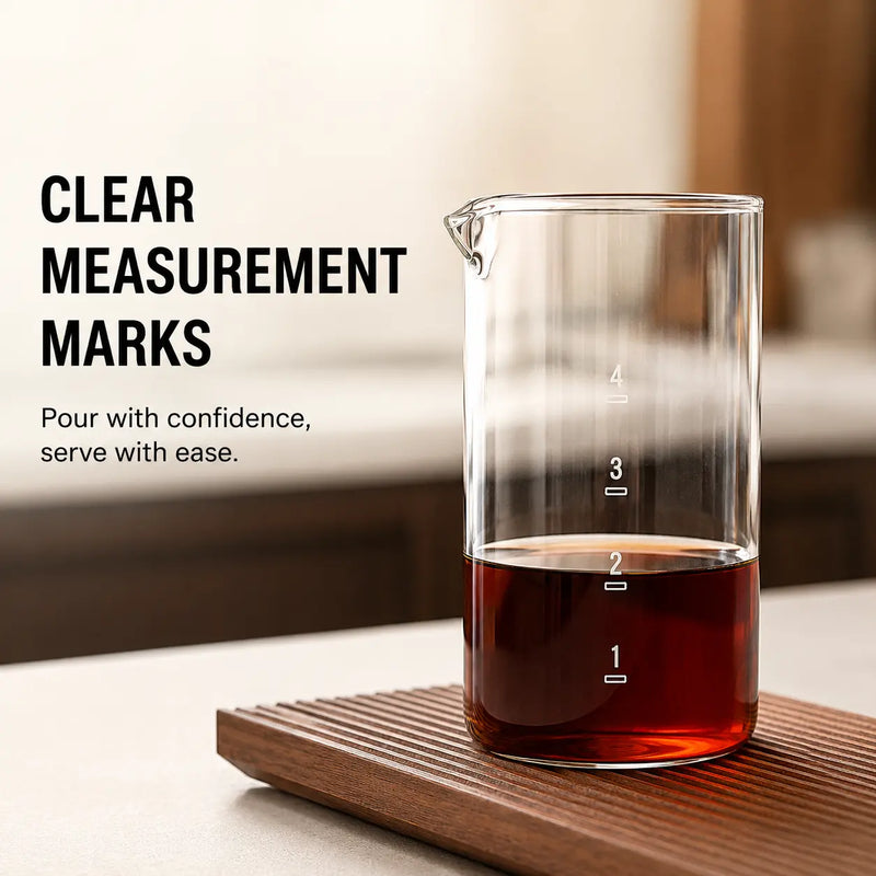 Cold brew glass carafe with clear measurement marks and pouring spout
